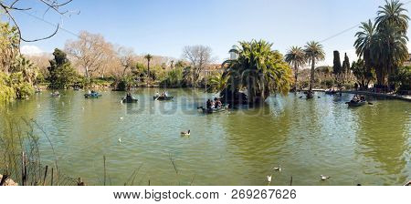 Barcelona, Spain - March 18, 2018: Tourists in Boats in Parc de la Ciutadella in Barcelona, Spain.