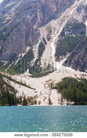 Mudflow With Snow High In The Alpine Mountains Lake, Lago Di Braies