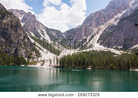 Mudflow With Snow High In The Alpine Mountains Lake, Lago Di Braies