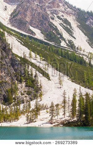 Mudflow With Snow High In The Alpine Mountains Lake, Lago Di Braies