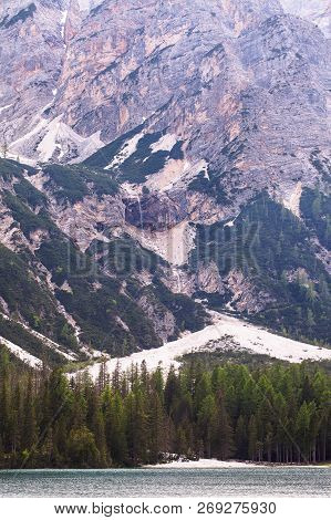 Mudflow With Snow High In The Alpine Mountains Lake, Lago Di Braies