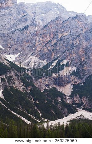 Mudflow With Snow High In The Alpine Mountains Lake, Lago Di Braies