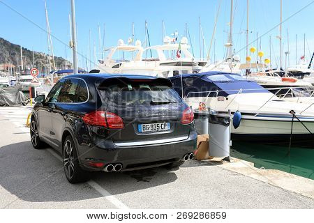 Menton, France - March 31, 2018: Luxury Porsche Cayenne Turbo Suv (rear View) Parked On The Port Of 
