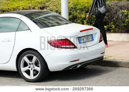 Menton, France - April 5, 2018: White Mercedes Slc 250d Parked In The Street Of Menton, French Rivie