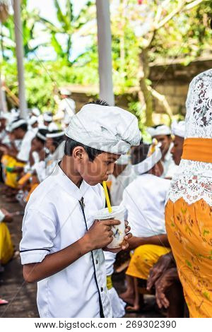 Bali, Indonesia - October 9, 2018: Balinese Boy In Traditional Clothes On Culture Ceremony, Ubud, Gi