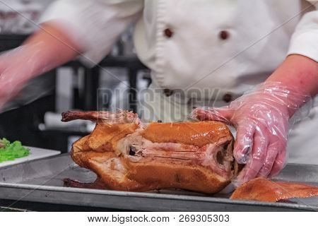Traditional Chinese Roast Duck Or Da Dong Kaoya Served Tableside At A Chinese Restaurant