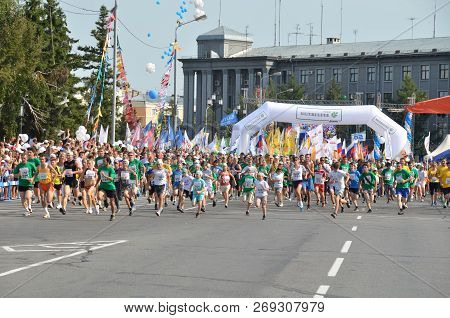 Omsk, Russia - August 12: Marathon Runners In Action At The Siberian International Marathon On Augus