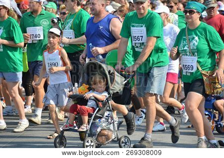 Omsk, Russia - August 12: Marathon Runners In Action At The Siberian International Marathon On Augus