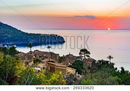 Beautiful View Of Old Rustic Mediterranean Village At The Coast Of Deia On Majorca, Spain Mediterran