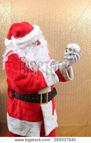Santa Claus. Santa Claus holds a Human Skull. Santa finds an old Elf Skull. Old Man Winter is scared. Sold my soul to Santa. 
