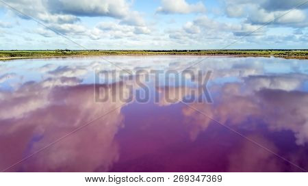 Clouds Reflecting In Pink Lake Aerial Photo