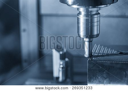 The  Cnc Milling Machine Cutting The Mold Part With The Index-able Ball End Mill .the Hi-technology 