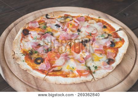 Closeup Fresh Hawii Pizza On Wood Plate