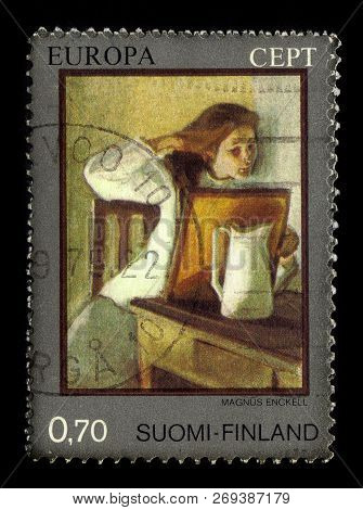 Finland - Circa 1975: Stamp Printed By Finland, Shows Girl Straightening Her Hair, Artwork By Magnus