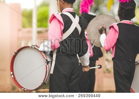Marching Band Drummers Perform In School Parade