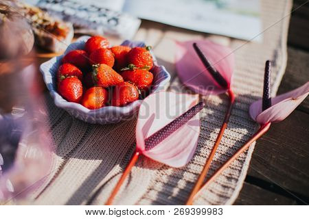 Appetizing Red Strawberry Is In A Bowl On The Table