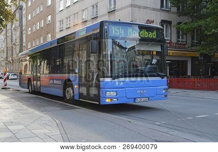 Munich, Germany - September, 2013: A Regular Bus On The Street Of Munich