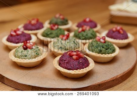 Pkhali appetizer on wooden board, traditional Georgian dish