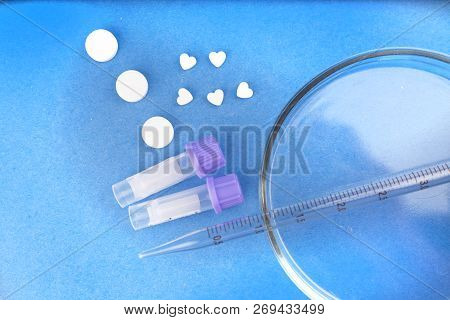 Drugs, Drugs, Doping, Test Tubes, Petri Dish On A Blue Background.
