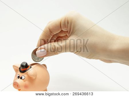 Put The Coin In The Piggy Bank, Close-up