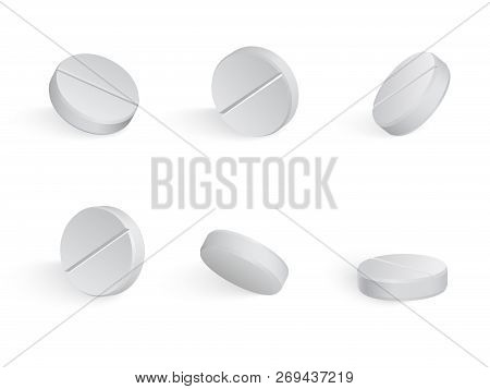 Round White Medical Tamblets In Different Positions.