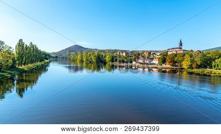 Radobyl Mountain In Ceske Stredohori, Central Bohemian Uplands. View From Labe River In Litomerice, 