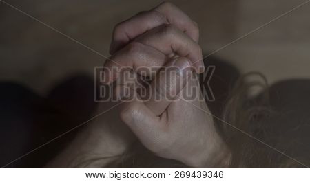 Mental Health Psychosis And Depression Photo. Close-up Hands Shrink From Nerves. Toning, Low Key, Se