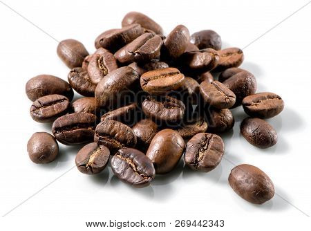 Roasted Coffee Beans Heap Close-up On White Background