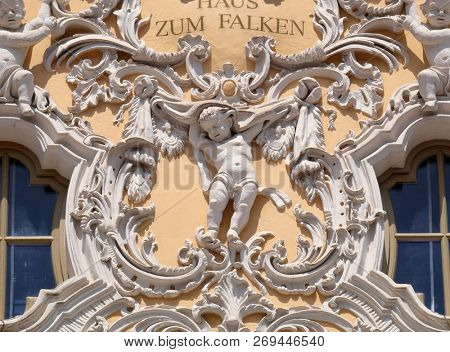 WURZBURG, GERMANY - JULY O4, 2018: Angel, House of Falcon, the finest Rococo style building in the Wurzburg, Germany
