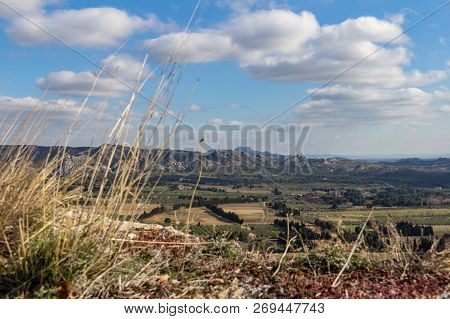 The Valley Between Les Baux De Provence And The Alpilles Mountains Are Dotted With Farms