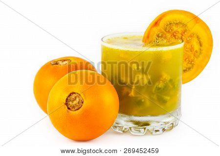 Traditional Colombian Beverage Made Of Juice And Pieces Of Lulo (solanum Quitoense) Called Lulada