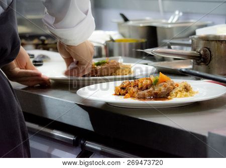 Chef Preparing Food, Meal, In The Kitchen, Chef Cooking, Chef Decorating Dish, Closeup, 
Chef At Wor