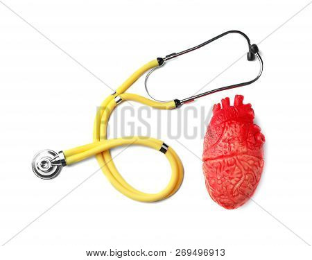 Stethoscope For Checking Pulse And Heart Model On White Background, Top View