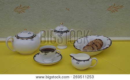 English Teacup With Saucer, Teapot, Cream Jug, Sugar Bowl And A Cake Bowl With Cookies, Fine Bone Ch