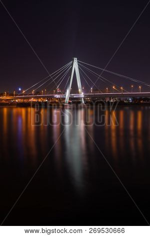 View Of The Illuminated Deutzer Bridge And The Long River Rhine At Night In Germany Cologne 2018.