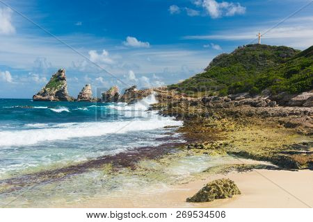 Rocks and hills  of Pointe des Chateaux, the most Eastern point of French island  of Guadeloupein the Caribbean
