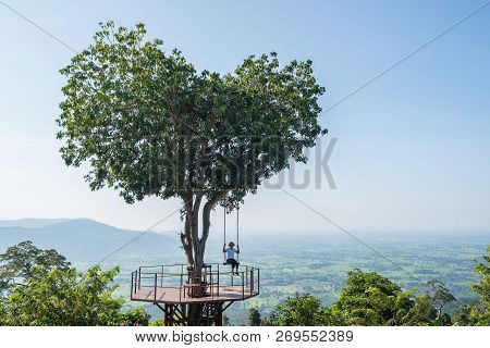 Phitsanulok ,thailand - October 12,2018 : The Thai Tourist Enjoy With Swing On Giant Heart Tree In 