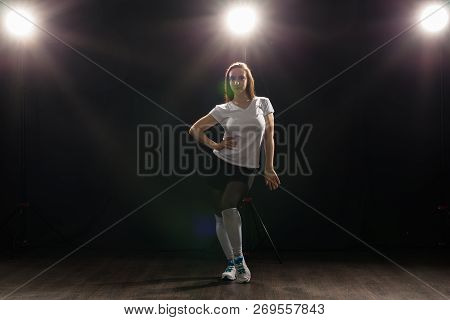 Hip-hop, Jazz-funk, Tecktonik, Waacking, Trance And Street Dances Concept - Young Woman Dancing Jazz