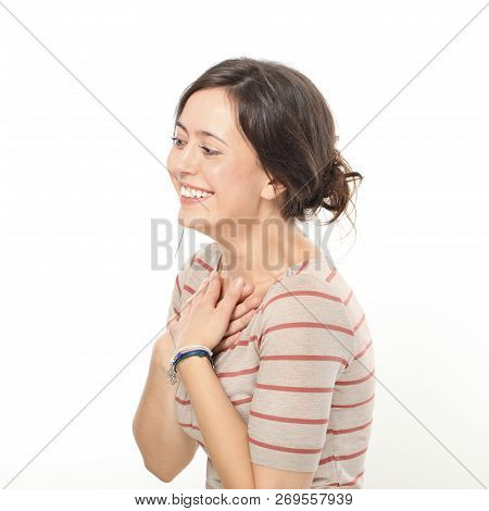 Pretty Woman Laughing And Holding Hands On Chest