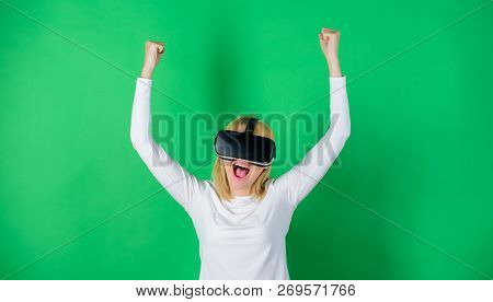 Confident Young Woman Adjusting Her Virtual Reality Headset And Smiling. Woman Using Vr Device. Augm