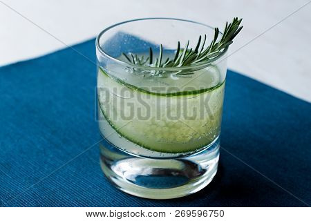 Rosemary Gin Gimlet Cocktail With Cucumber Slice.