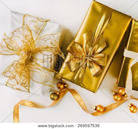 Topv View Of Golden Christmas Gift Boxes