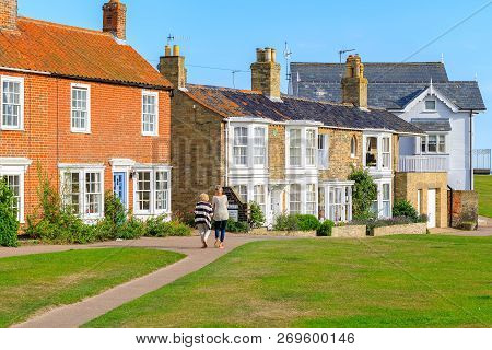 Southwold, Uk - September 6, 18 - Back View Of Two Female Tourists Walking In The Popular Seaside To