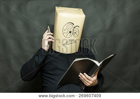 Emotion Concept. A Man Looks Into A Book. Talking On The Phone. Facial Expression Inconvenience And 