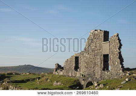 Beautiful Landscape Sunset Image Over Abandoned Foggintor Quarry In Dartmoor With Raking Soft Sunlig