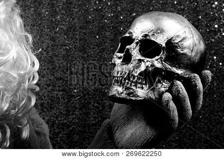 Santa Claus. Santa Preforms Shakespeare's Hamlet in black and white.  Alas, poor Yorick! I knew him well.