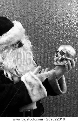 Santa Claus. Santa Preforms Shakespeare's Hamlet in black and white.  Alas, poor Yorick! I knew him well.
