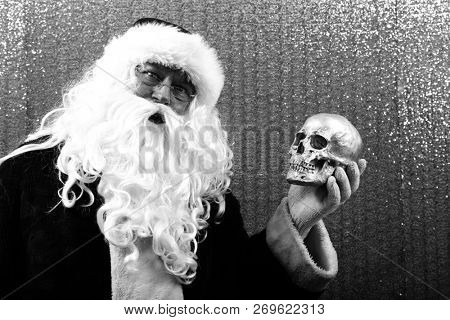 Santa Claus. Santa Preforms Shakespeare's Hamlet in black and white.  Alas, poor Yorick! I knew him well.