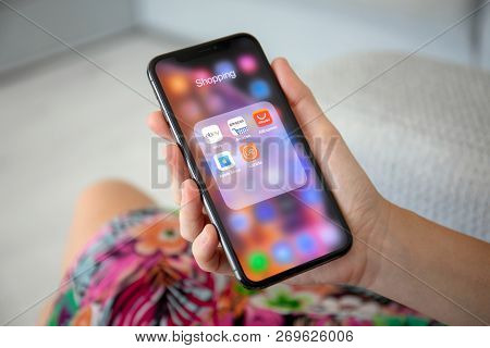 Alushta, Russia - September 27, 2018: Woman Holding Iphone X With Top Internet Shopping Service On T
