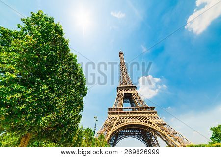 Sun Shining Over Effel Tower In Paris, France